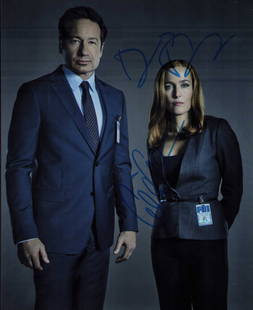 X-Files signed cast photograph: David Duchovney and Gillian Anderson signed 8x10 from later X-Files film Certificate of AuthenticityEVERY item in this auction comes with at minimum a full illustrated serial numbered COA signed by