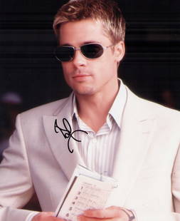 Brad Pitt signed photograph: A sexy young signed 8x10 of the mega star Certificate of AuthenticityEVERY item in this auction comes with at minimum a full illustrated serial numbered COA signed by the worlds leading