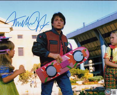 Michael J Fox Beckett signed photograph: A Beckett stickered Back to the Future signed 8x10 of him signed nicely Certificate of AuthenticityEVERY item in this auction comes with at minimum a full illustrated serial numbered COA signed by the