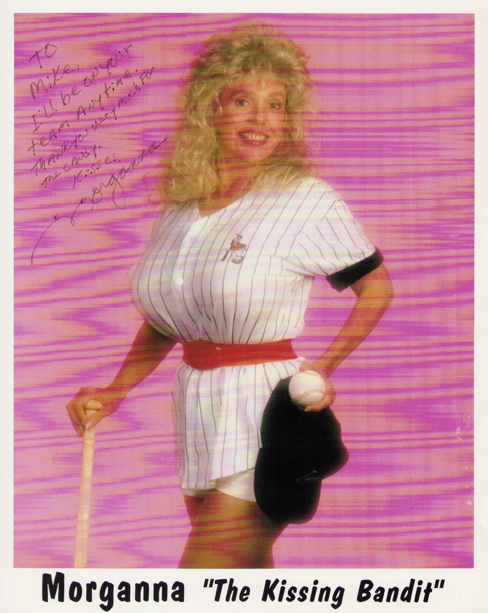 Morganna signed photograph: "A signed shot of the Kissing bandit famous for running out onto the field and kissing a ball player showing off her unique attributes Certificate of AuthenticityEVERY item in this auction comes with 