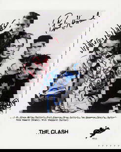 The Clash signed photograph: A vintage shot signed by the entire band Certificate of AuthenticityEVERY item in this auction comes with at minimum a full illustrated serial numbered COA signed by the worlds leading authenticator i