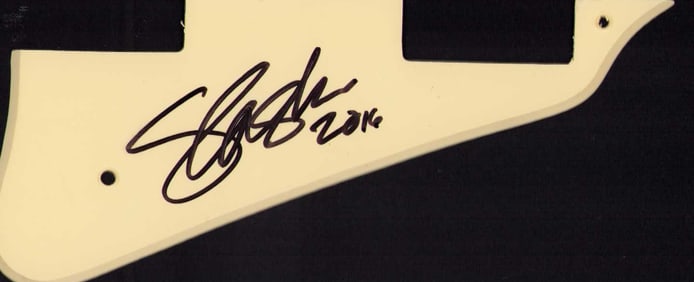Slash signed guitar pick