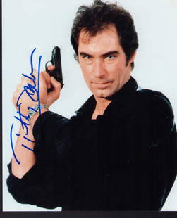 Timothy Dalton James Bond signed photograph: As James Bond signed 8x10 Certificate of AuthenticityEVERY item in this auction comes with at minimum a full illustrated serial numbered COA signed by the worlds leading authenticator in Entertainment