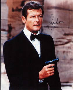 Roger Moore James Bond signed photograph: As James Bond signed 8x10 Certificate of AuthenticityEVERY item in this auction comes with at minimum a full illustrated serial numbered COA signed by the worlds leading authenticator in Entertainment