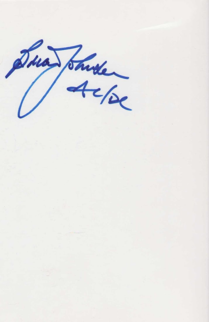 Brian Johnston AC DC signed page (1 of 1)