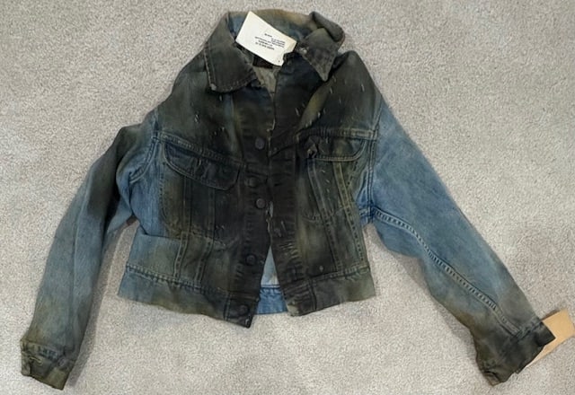 Priscilla Presley Naked Gun costume screen worn: Screen worn damaged denim jacket from Naked Gun with labels tags Certificate of AuthenticityEVERY item in this auction comes with at minimum a full illustrated serial numbered COA signed by the worlds