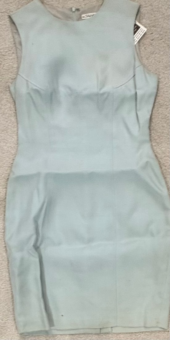 Hope Floats Sandra Bullock worn dress: With tags and coas this on screen dress worn in the film by Bullock Certificate of AuthenticityEVERY item in this auction comes with at minimum a full illustrated serial numbered COA signed by the wor