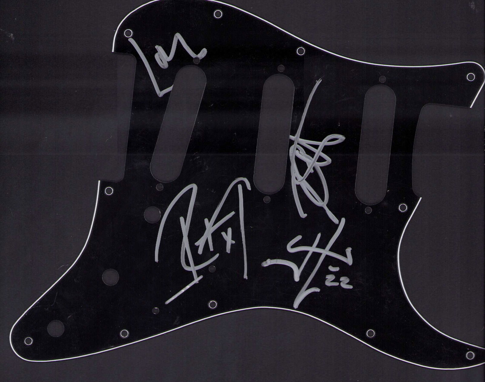 Metallica signed guitar pickguard: A black Fender strat style guitar pickguard signed by Hetfield Hammett Ulrich and Trujillo of Metallica approx 9x10 Certificate of AuthenticityEVERY item in this auction comes with at minimum a full i