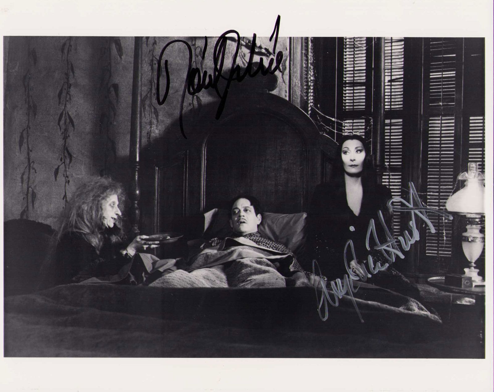 Raul Julia and Angelica Houston signed Addams Family photograph (1 of 1)