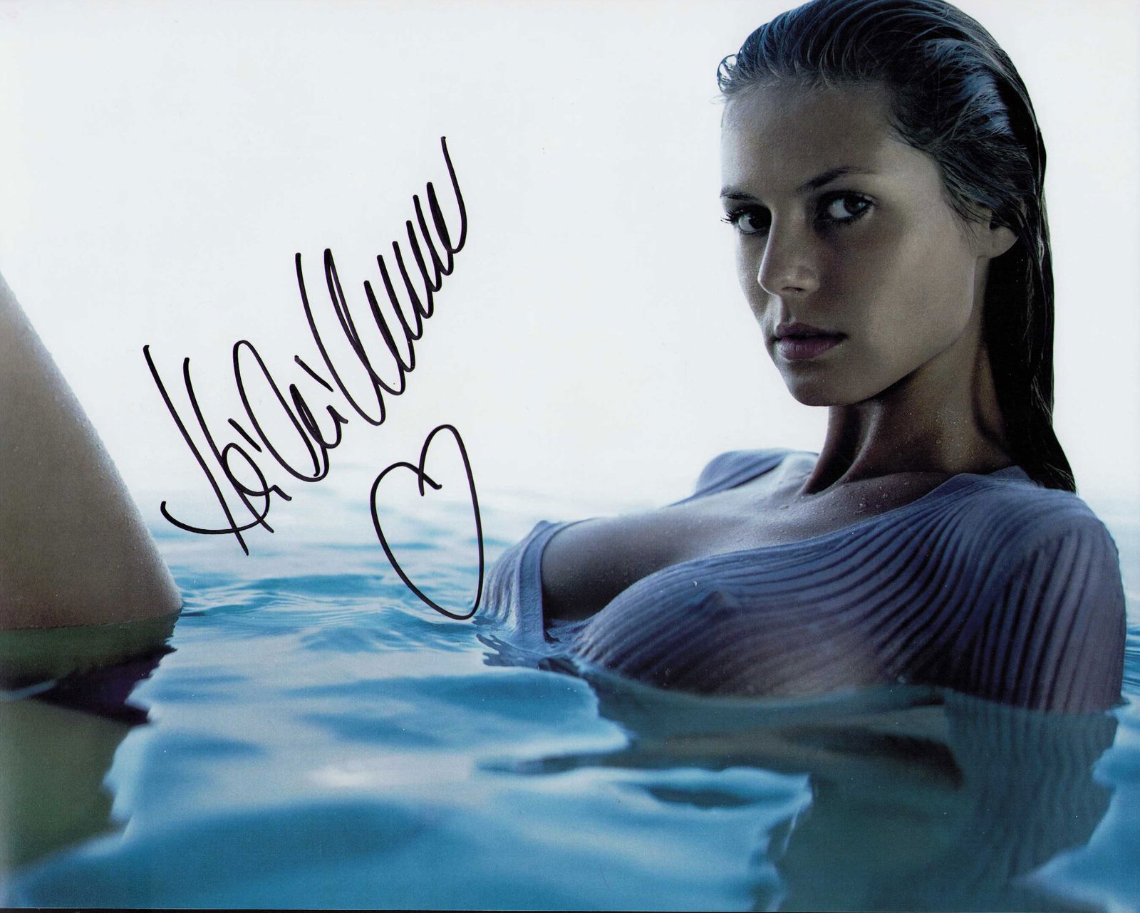Heidi Klum sexy signed 11x14 photograph: A sexy signed 11x14 of the supermodel turned Tv judge Certificate of AuthenticityEVERY item in this auction comes with at minimum a fully illustrated and serial numbered COA signed by the worlds leadi