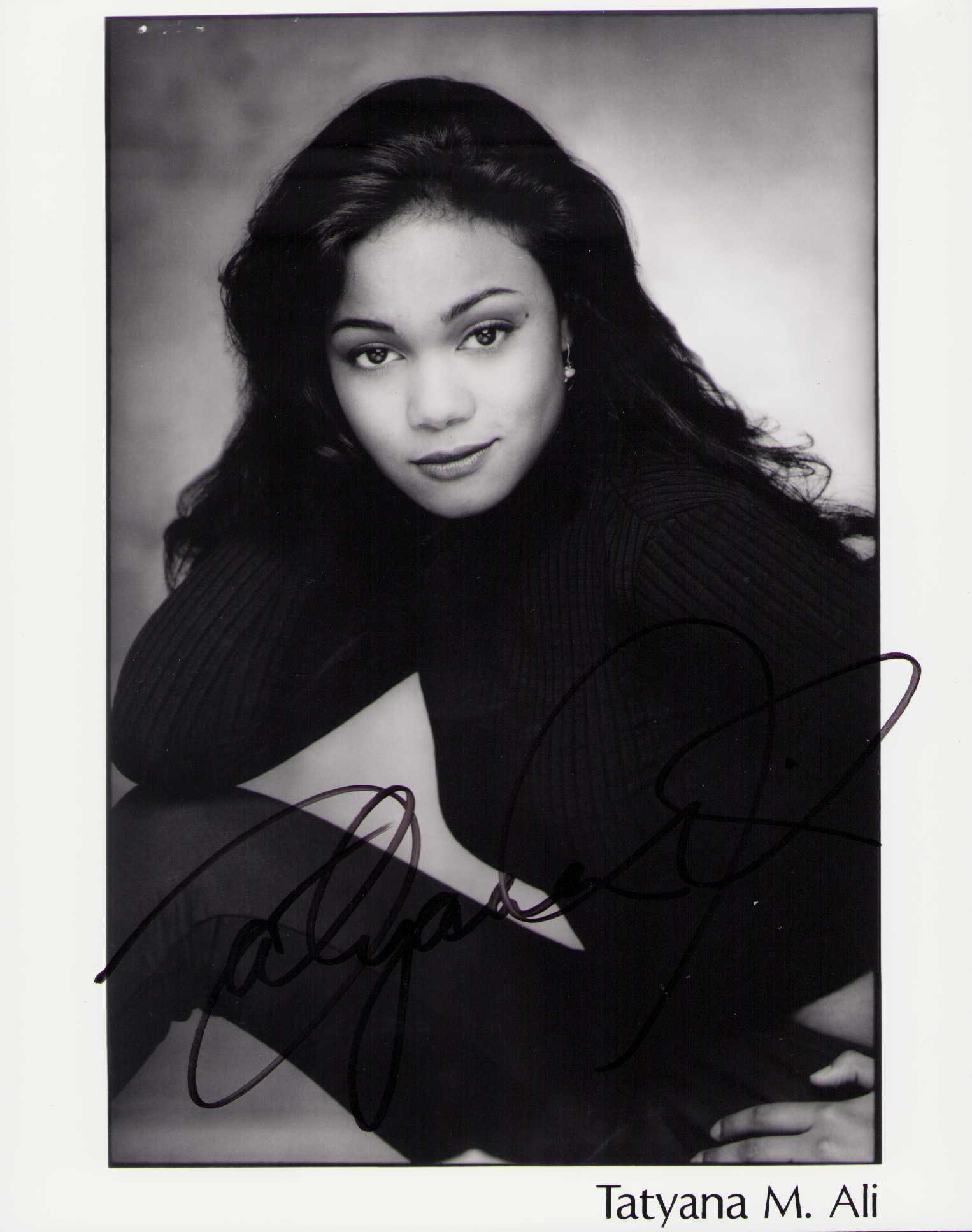 Tatyana Ali signed photograph: A vintage signed 8x10 publicity still by Muhammad Alis fighter daughter Certificate of AuthenticityEVERY item in this auction comes with at minimum a fully illustrated and serial numbered COA signed b