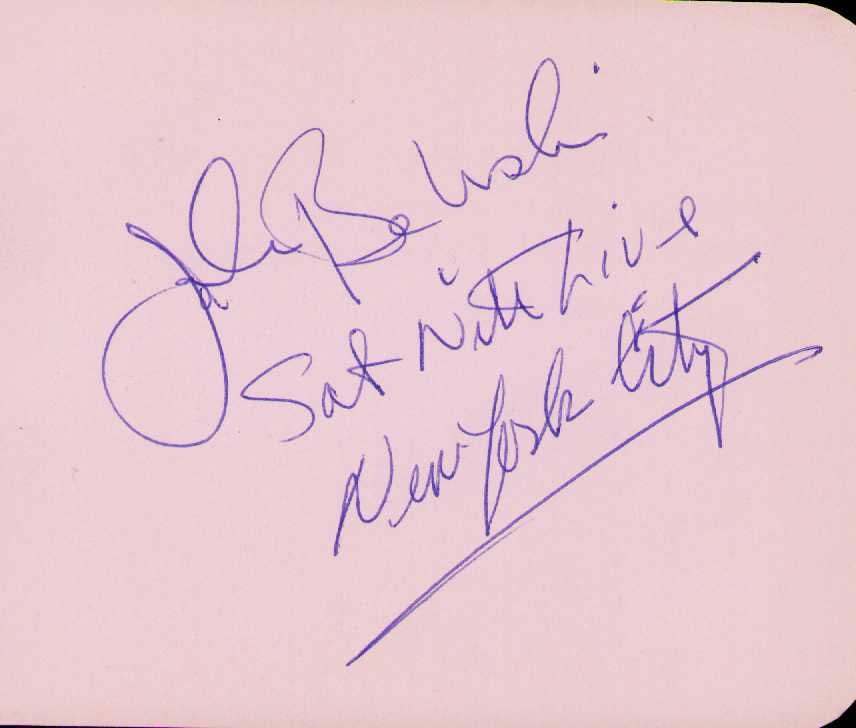 John Belushi signature on page (1 of 1)