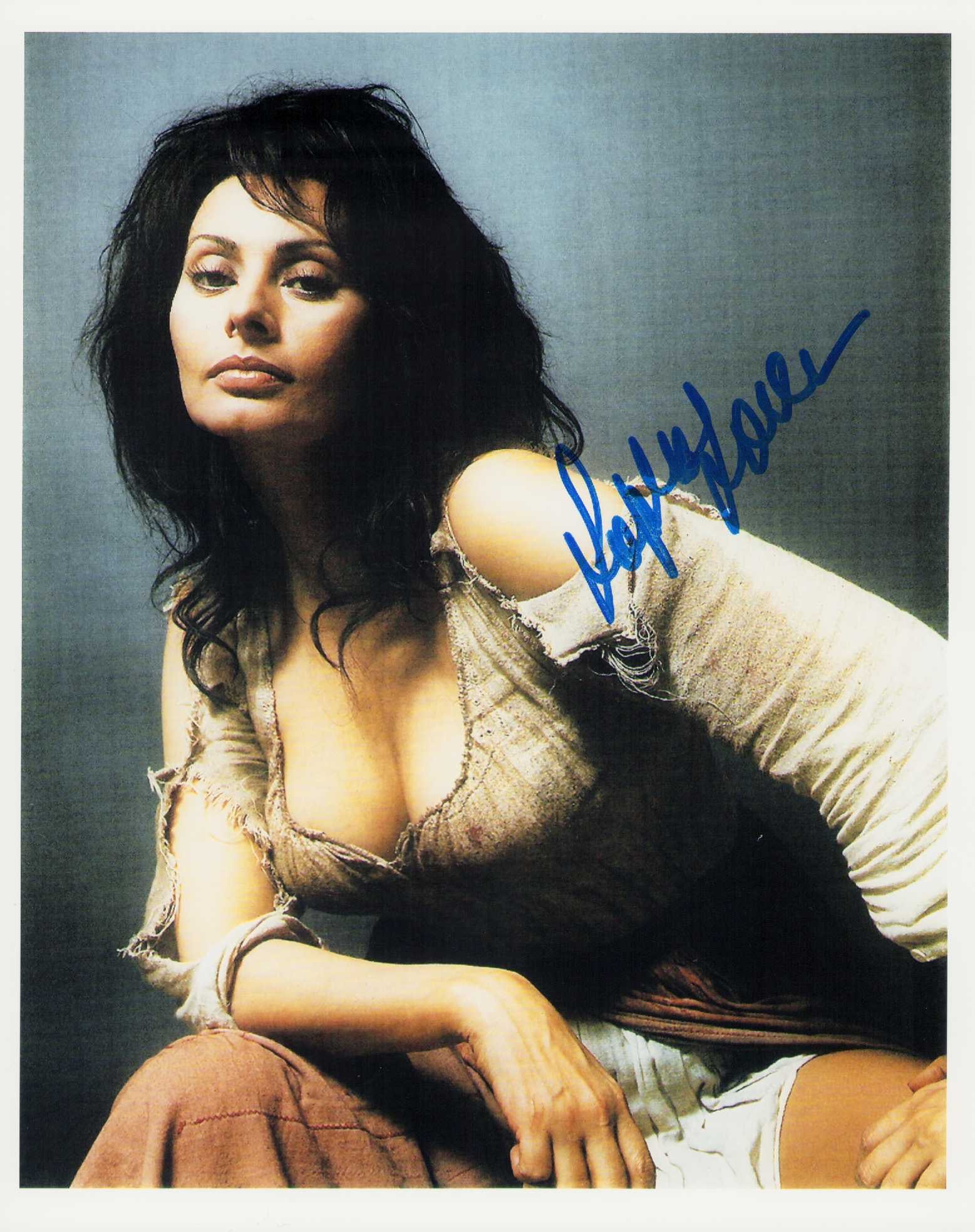 Sophia Loren signed photograph: A sexy signed 8x10 of the Italian legend Certificate of AuthenticityEVERY item in this auction comes with at minimum a fully illustrated and serial numbered COA signed by the worlds leading authentica