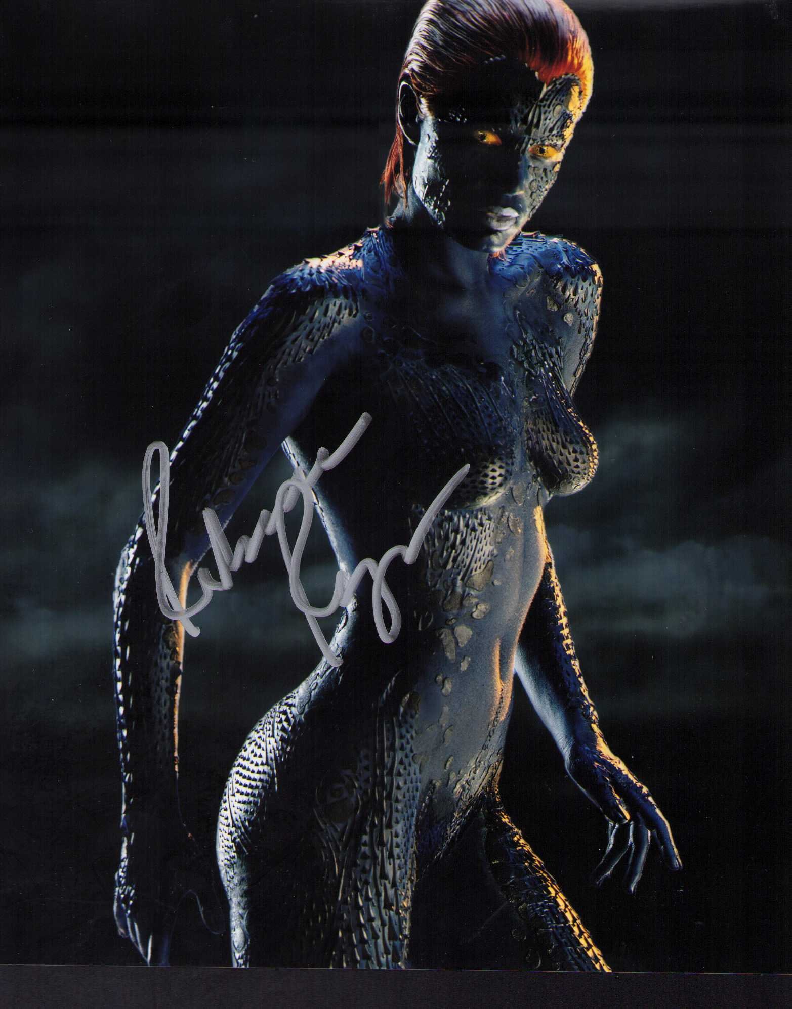 Rebecca Romijn signed photograph: A sexy Xmen signed 8x10 in body paint by her Certificate of AuthenticityEVERY item in this auction comes with at minimum a fully illustrated and serial numbered COA signed by the worlds leading authen