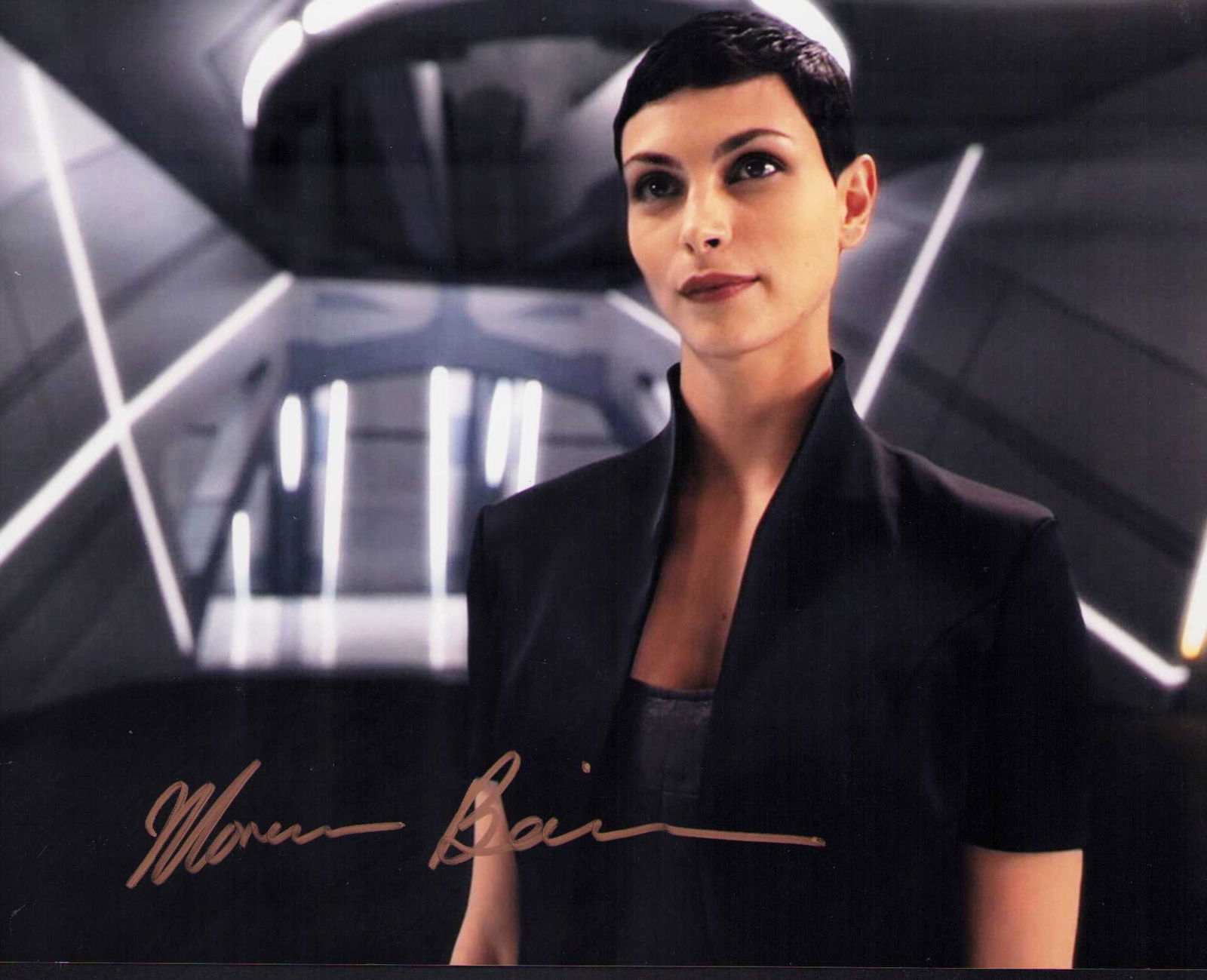 Morena Baccarin signed photograph: A sexy signed 8x10 of Tv and film star Certificate of AuthenticityEVERY item in this auction comes with at minimum a fully illustrated and serial numbered COA signed by the worlds leading authenticato