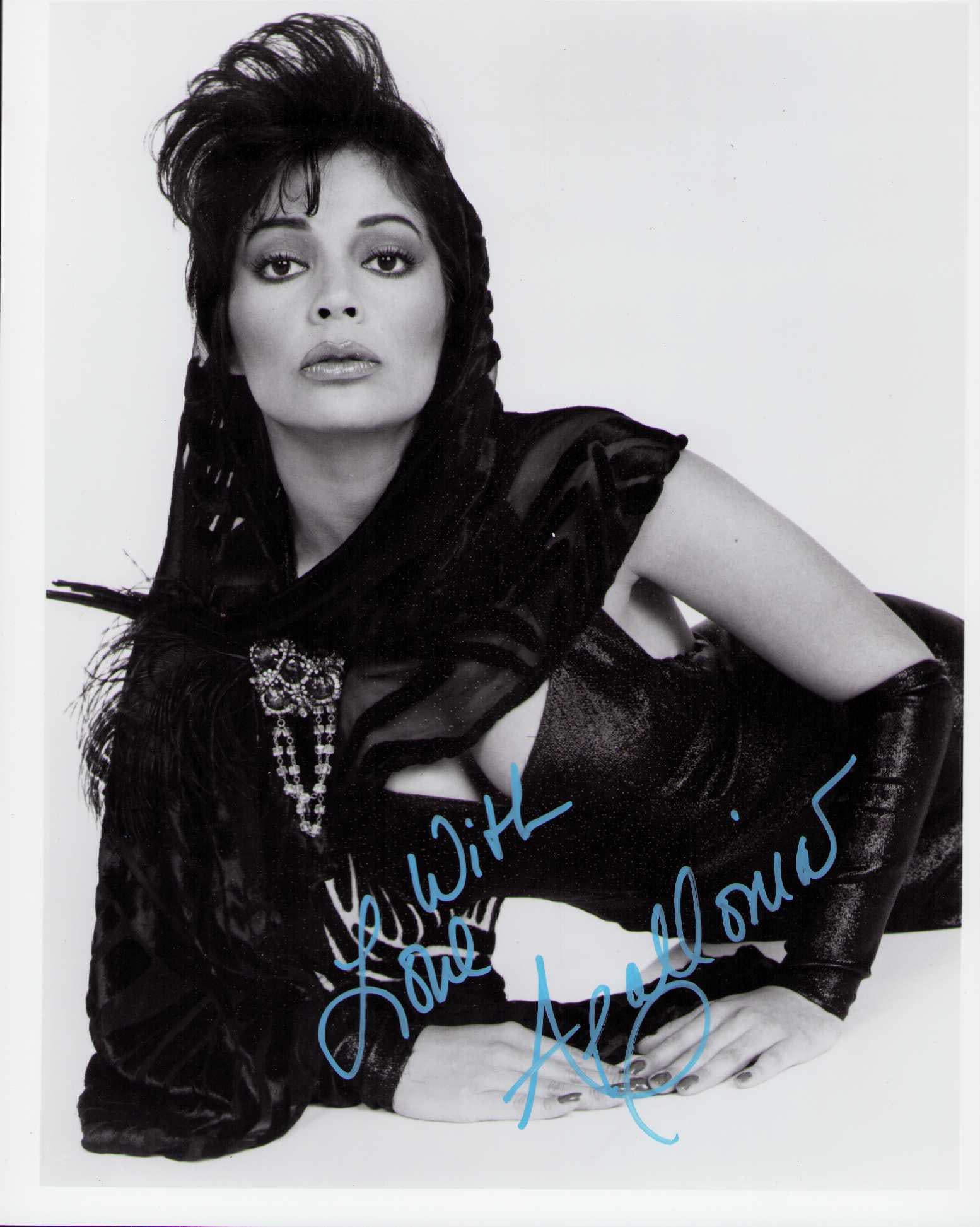 Apollonia signed photograph: A vintage signed 8x10 of the singer Certificate of AuthenticityEVERY item in this auction comes with at minimum a fully illustrated and serial numbered COA signed by the worlds leading authenticator i