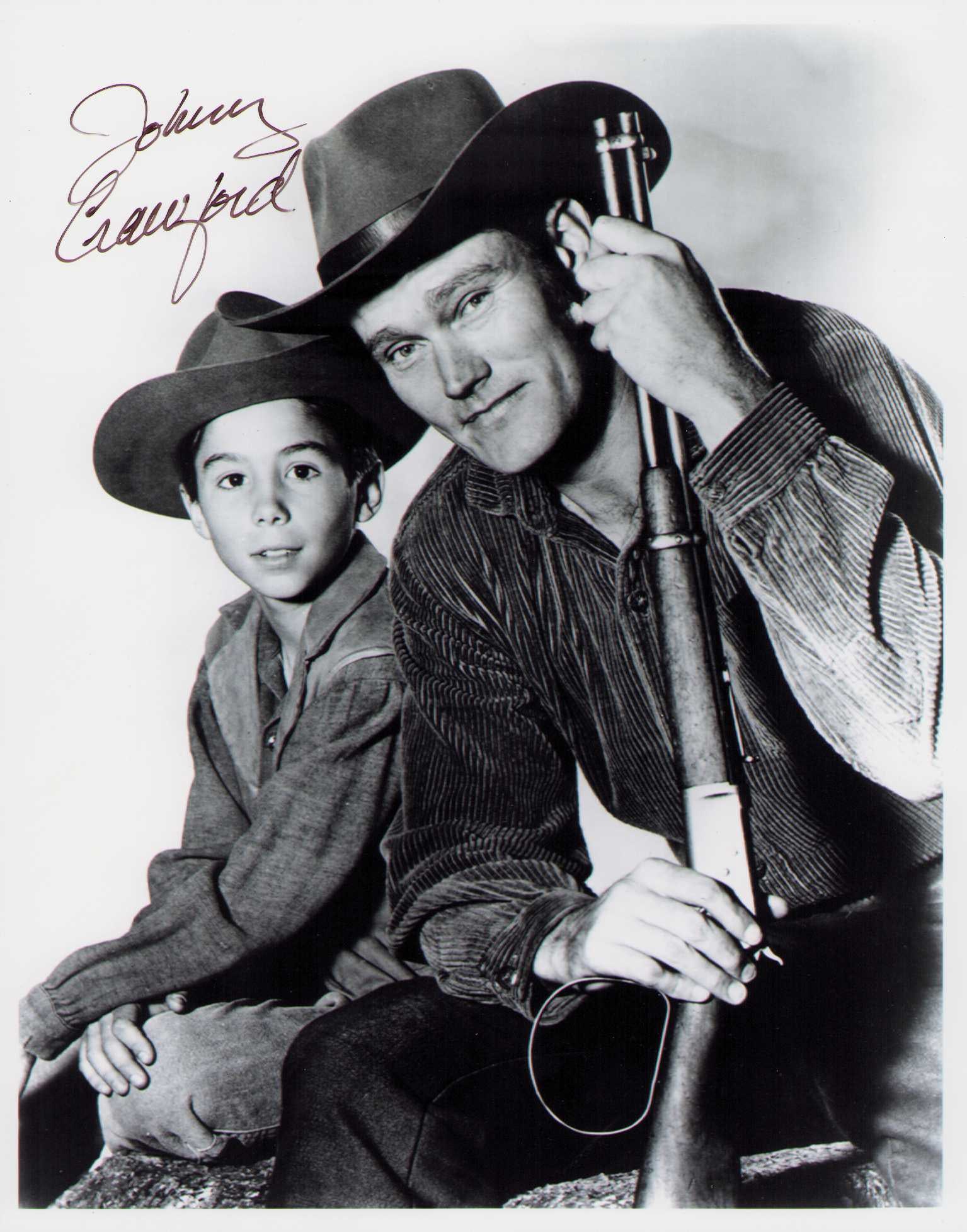 Johnny Crawford signed photo: Child star from TVS the Rifleman show Certificate of AuthenticityEVERY item in this auction comes with at minimum a fully illustrated and serial numbered COA signed by the worlds leading authenticator