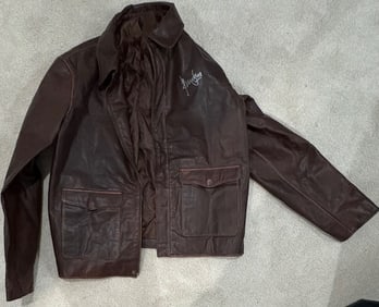 Indiana Jones replica leather jacket signed by Ford/Beckett