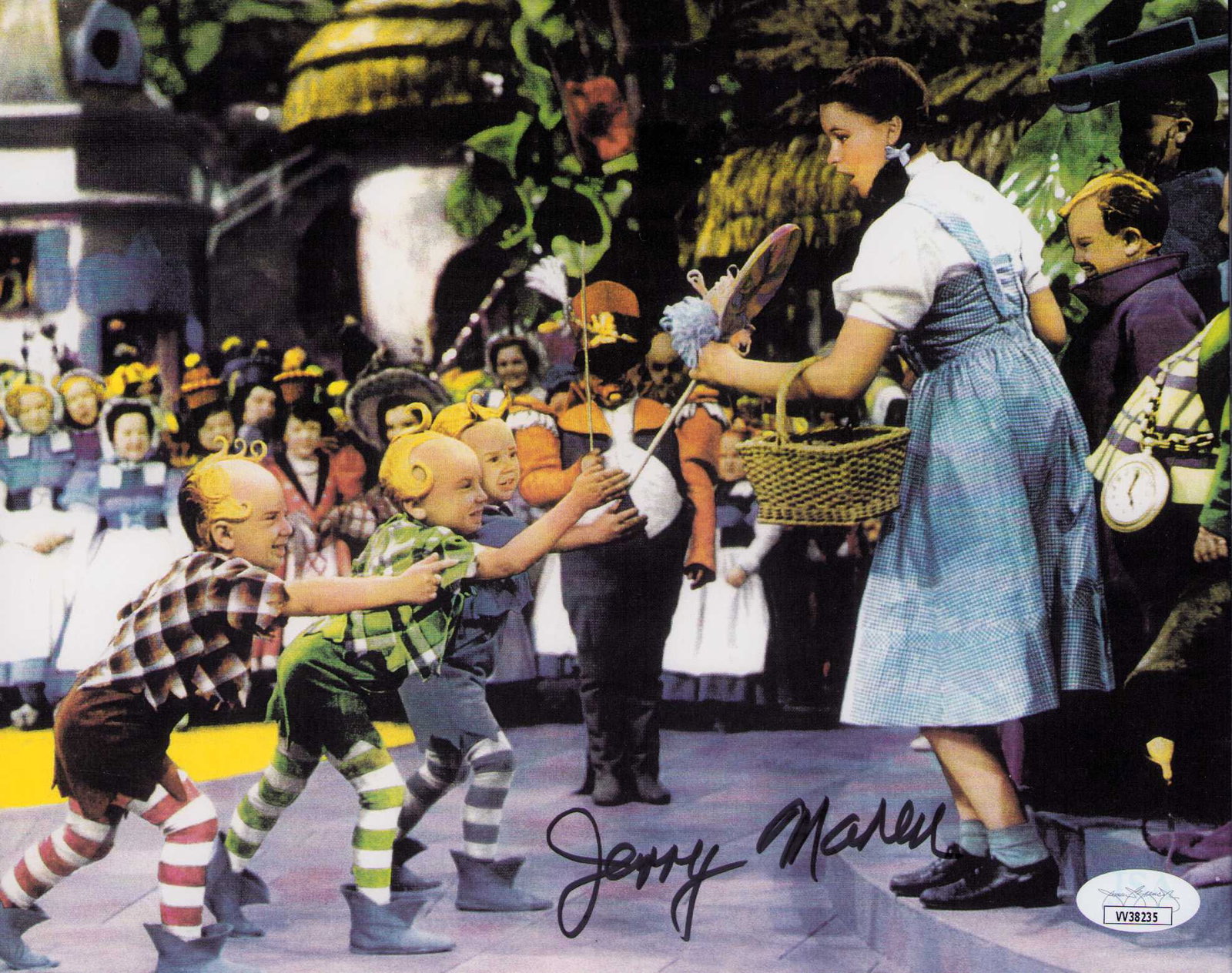 Jerry Maren signed Wizard of Oz photo 8x10: As the Lolipop Guild he was the munchkin who sang in the film signed 8x10 with JSA stickering Certificate of AuthenticityEVERY item in this auction comes with at minimum a fully illustrated and serial