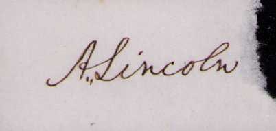 Abraham Lincoln signature on slip with accompanying items