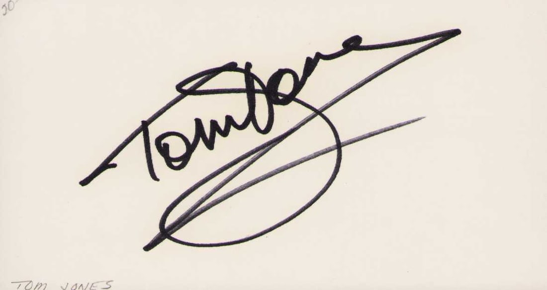 Tom Jones signature: A nice in person signed card by legendary singer Certificate of AuthenticityEVERY item in this auction comes with at minimum a fully illustrated and serial numbered COA signed by the worlds leading au