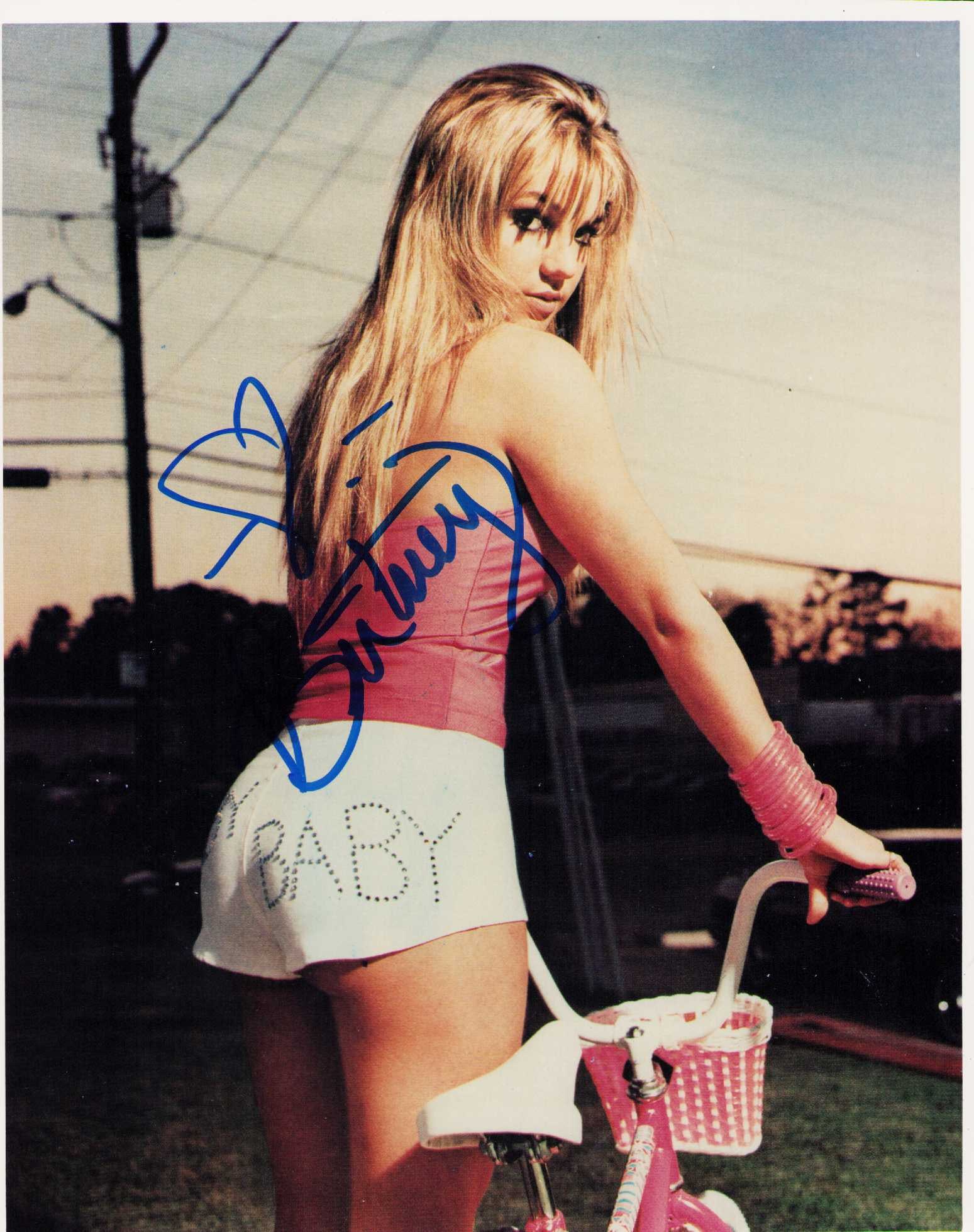 Britney Spears signed photograph: A VINTAGE sexy young signed 8x10 of Brit Certificate of AuthenticityEVERY item in this auction comes with at minimum a fully illustrated and serial numbered COA signed by the worlds leading authentica