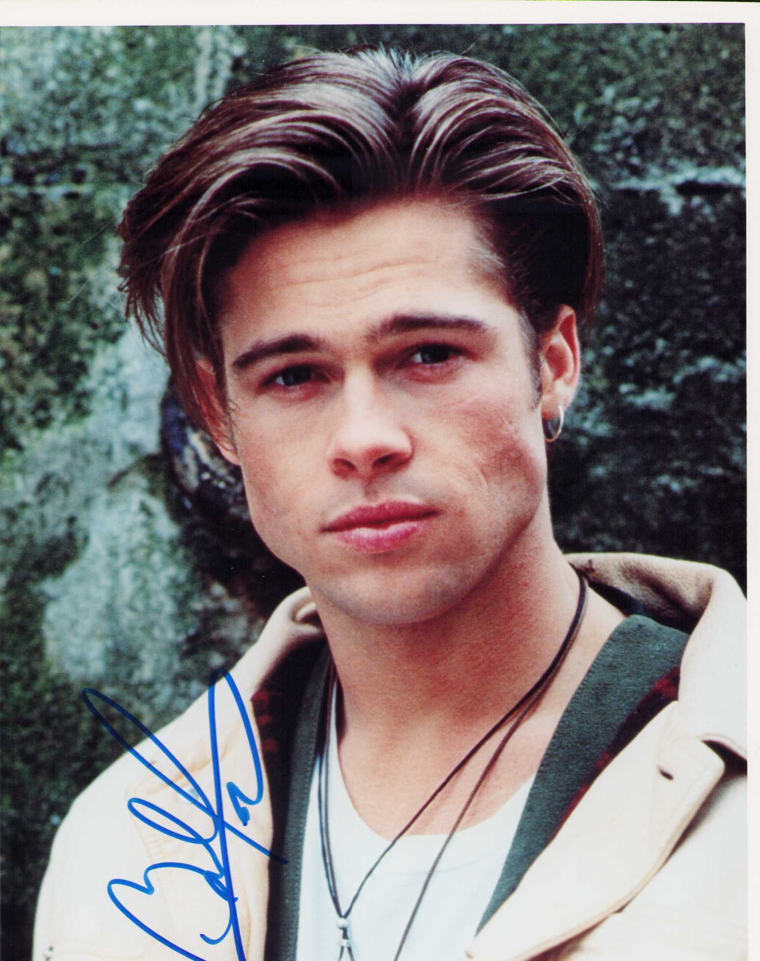 Brad Pitt signed photograph: A VINTAGE River Runs Through it era signed 8x10 with nearly a full signature Certificate of AuthenticityEVERY item in this auction comes with at minimum a fully illustrated and serial numbered COA sig