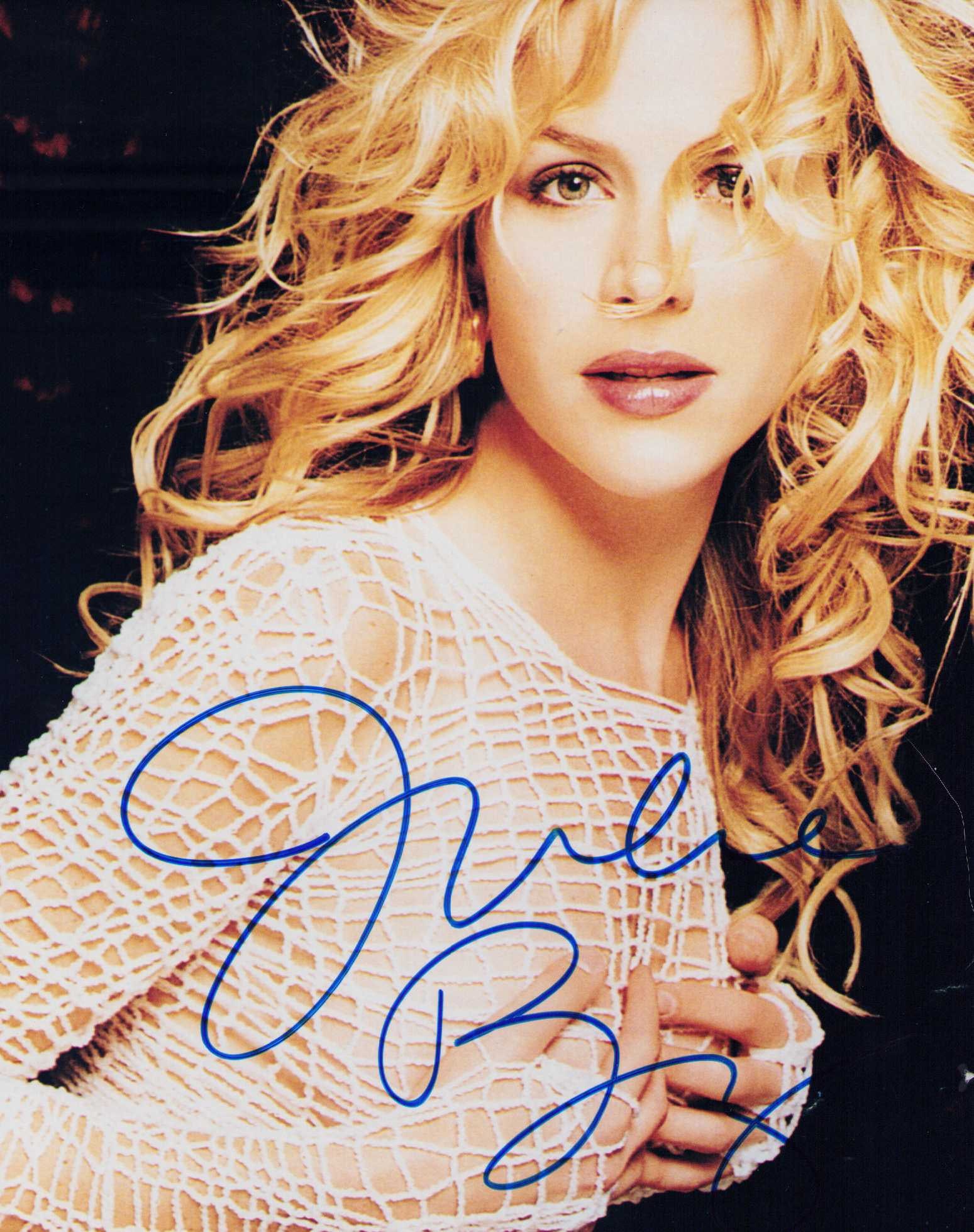 Julie Benz signed photograph: A sexy vintage signed 8x10 of the actress Certificate of AuthenticityEVERY item in this auction comes with at minimum a fully illustrated and serial numbered COA signed by the worlds leading authentic