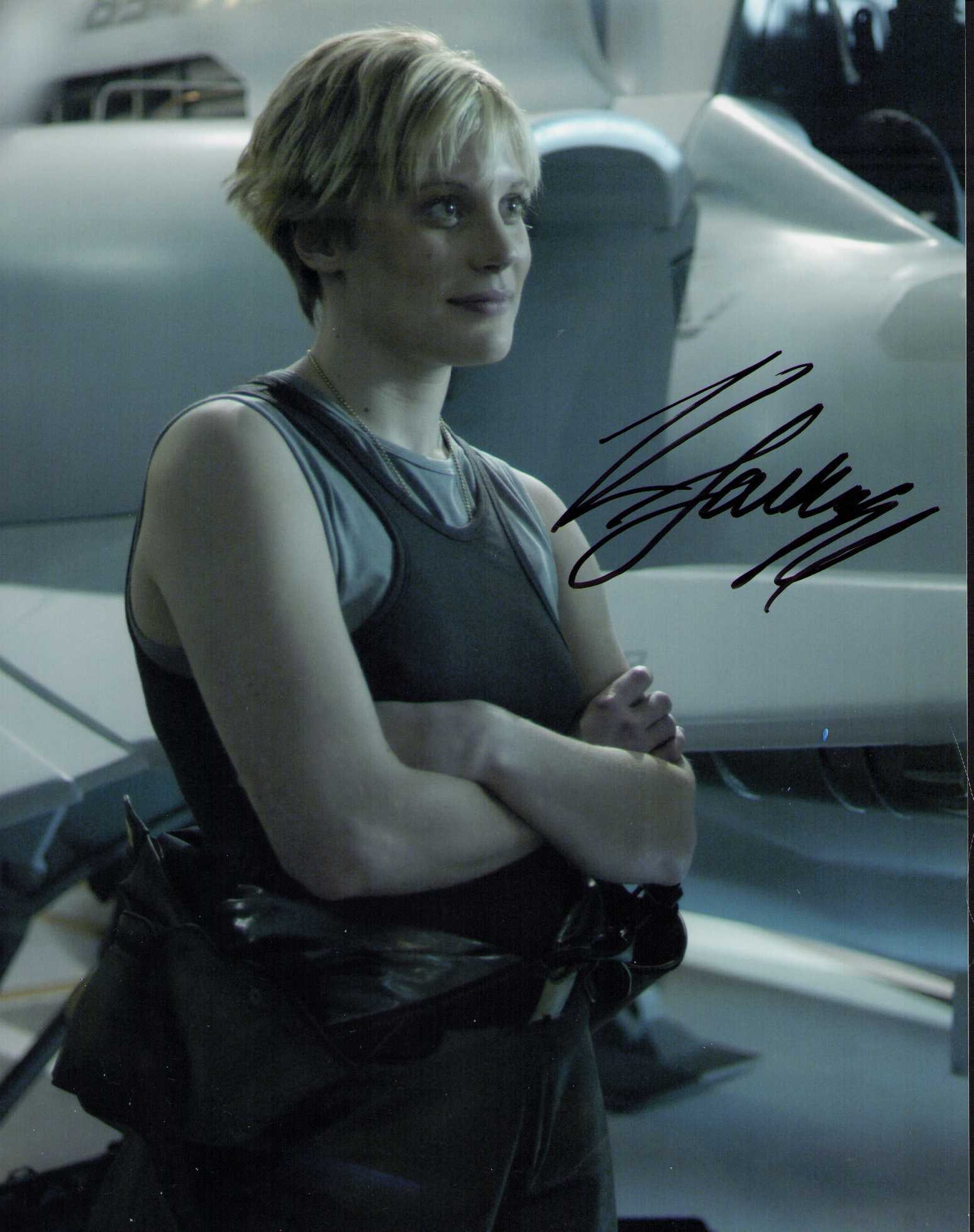 Katee Sackoff signed photograph: A Battlestar Galactica signed 8x10 of the sexy star in character from the series Certificate of AuthenticityEVERY item in this auction comes with at minimum a fully illustrated and serial numbered COA