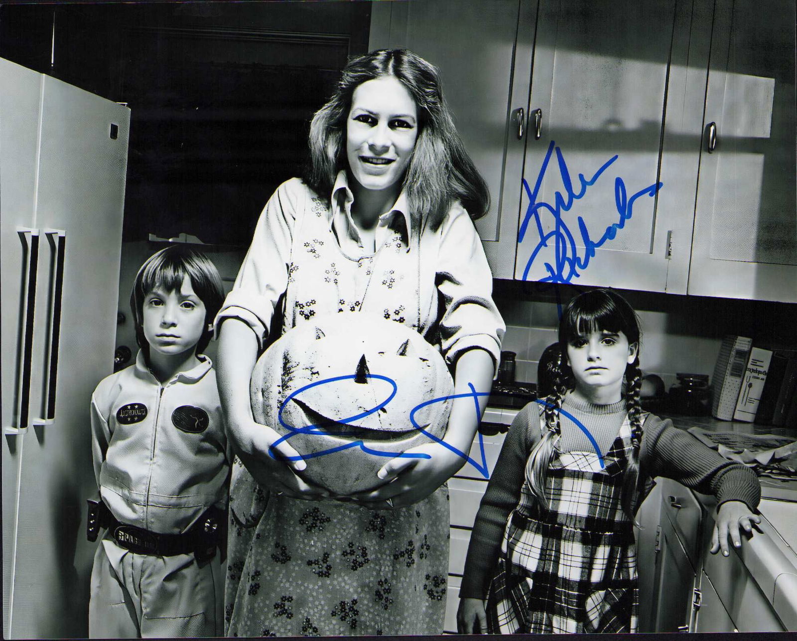 Halloween signed cast photograph: From original film signed by Jamie Lee Curtis and child star Kyle Richards Certificate of AuthenticityEVERY item in this auction comes with at minimum a fully illustrated and serial numbered COA