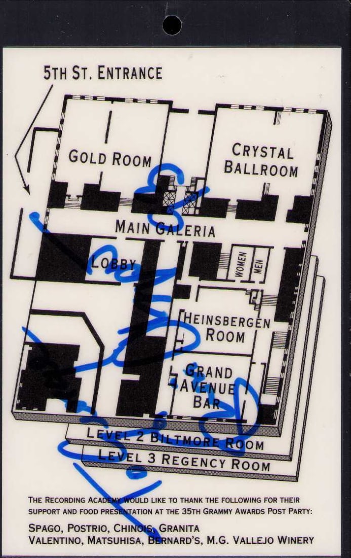 Eric Clapton signed Grammy lanyard: A 35th Annual Grammy original lanyard signed on the back by Clapton who also dated it and wrote it to George Certificate of AuthenticityEVERY item in this auction comes with at minimum a fully illustr