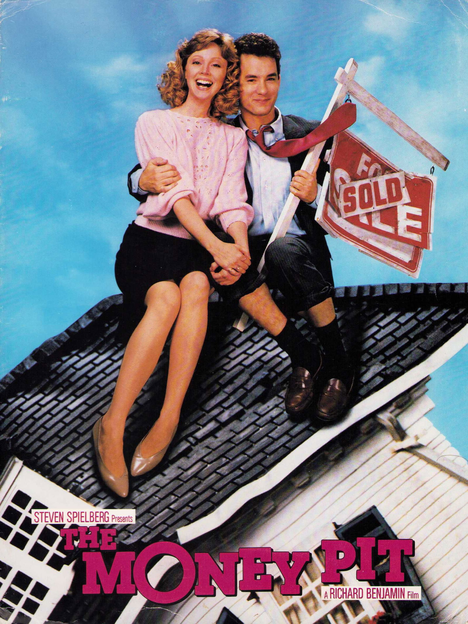 Money Pit cast signed program: An 11x14 fold uut brochure for premiere of the Money Pit signed on the back by Tom Hanks and Shelley Long with along sentiment Certificate of AuthenticityEVERY item in this auction comes with at