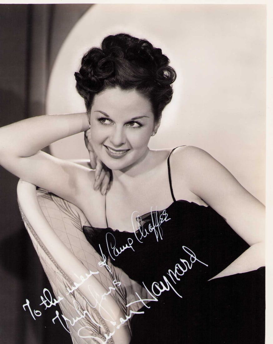 Susan Hayward signed photograph: A fantastic vintage signed in white paint pen still of the actress who died young Certificate of AuthenticityEVERY item in this auction comes with at minimum a fully illustrated and serial numbered