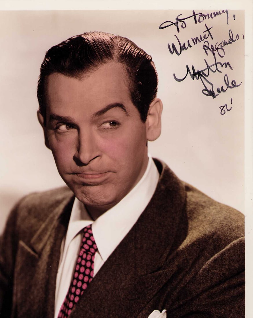 Milton Berle signed photograph: Vintage of Americas first Tv star hand colored still signed by Unvle Miltie Certificate of AuthenticityEVERY item in this auction comes with at minimum a fully illustrated and serial numbered COA