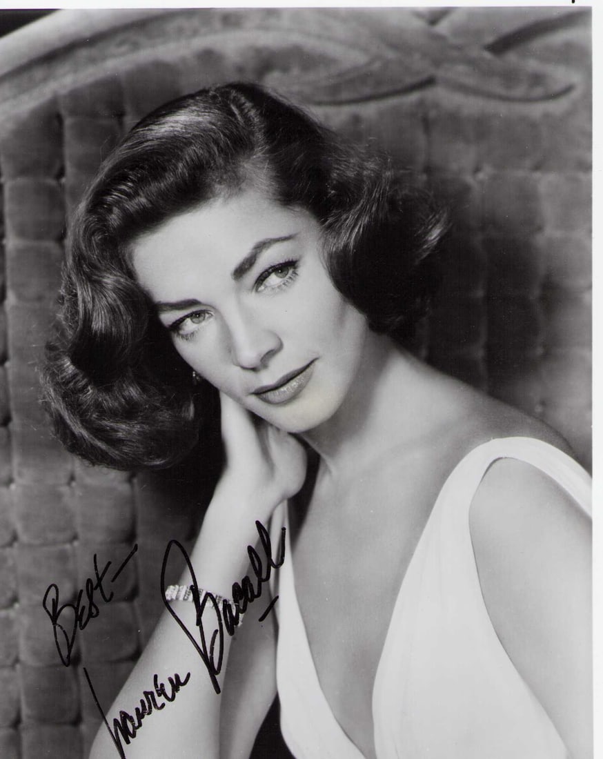 Lauren Bacall signed photograph B: A later than earlier lot approx 60s image signed later in life by the screen legend Certificate of AuthenticityEVERY item in this auction comes with at minimum a fully illustrated and serial