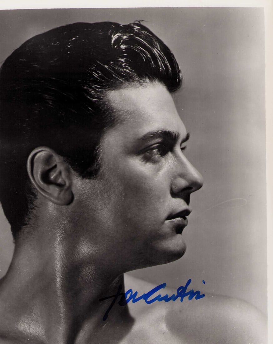 Tony Curtis signed photograph: An original still of a 18 year old Curtis signed later in life rare Certificate of AuthenticityEVERY item in this auction comes with at minimum a fully illustrated and serial numbered COA signed by