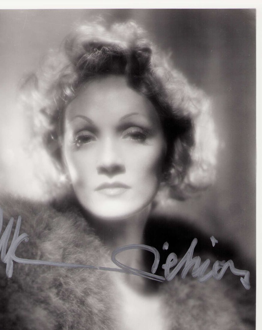 Marlene Dietrich signed photograph: A vintage signed later in life 8x10 of the film legend Certificate of AuthenticityEVERY item in this auction comes with at minimum a fully illustrated and serial numbered COA signed by the worlds