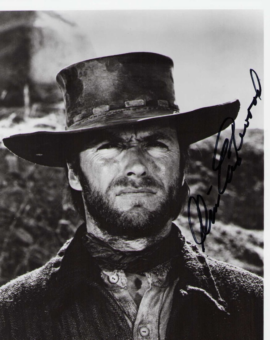 Clint Eastwood signed photograph: A VINTAGE signed 8x10 from his early western films signed in the late 1970s nice ! Certificate of AuthenticityEVERY item in this auction comes with at minimum a fully illustrated and serial