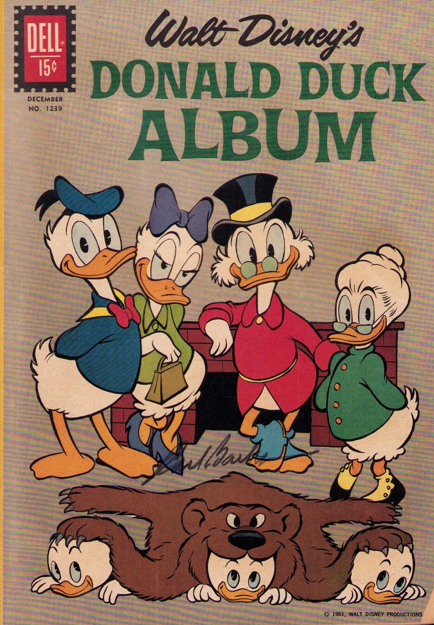 Donald Duck Album Carl Barks signed comic book: A rare early Duck comic signed by THE original Duck Disney animator legend Carl Barks Certificate of AuthenticityEVERY item in this auction comes with at minimum a fully illustrated and serial numbere