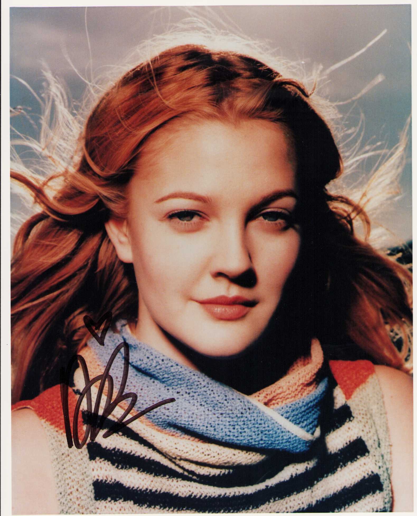 Drew Barrymore signed photograph: A young vintage signed 8x10 of the legendary actress Certificate of AuthenticityEVERY item in this auction comes with at minimum one fully illustrated and serial numbered COA signed by the worlds lead