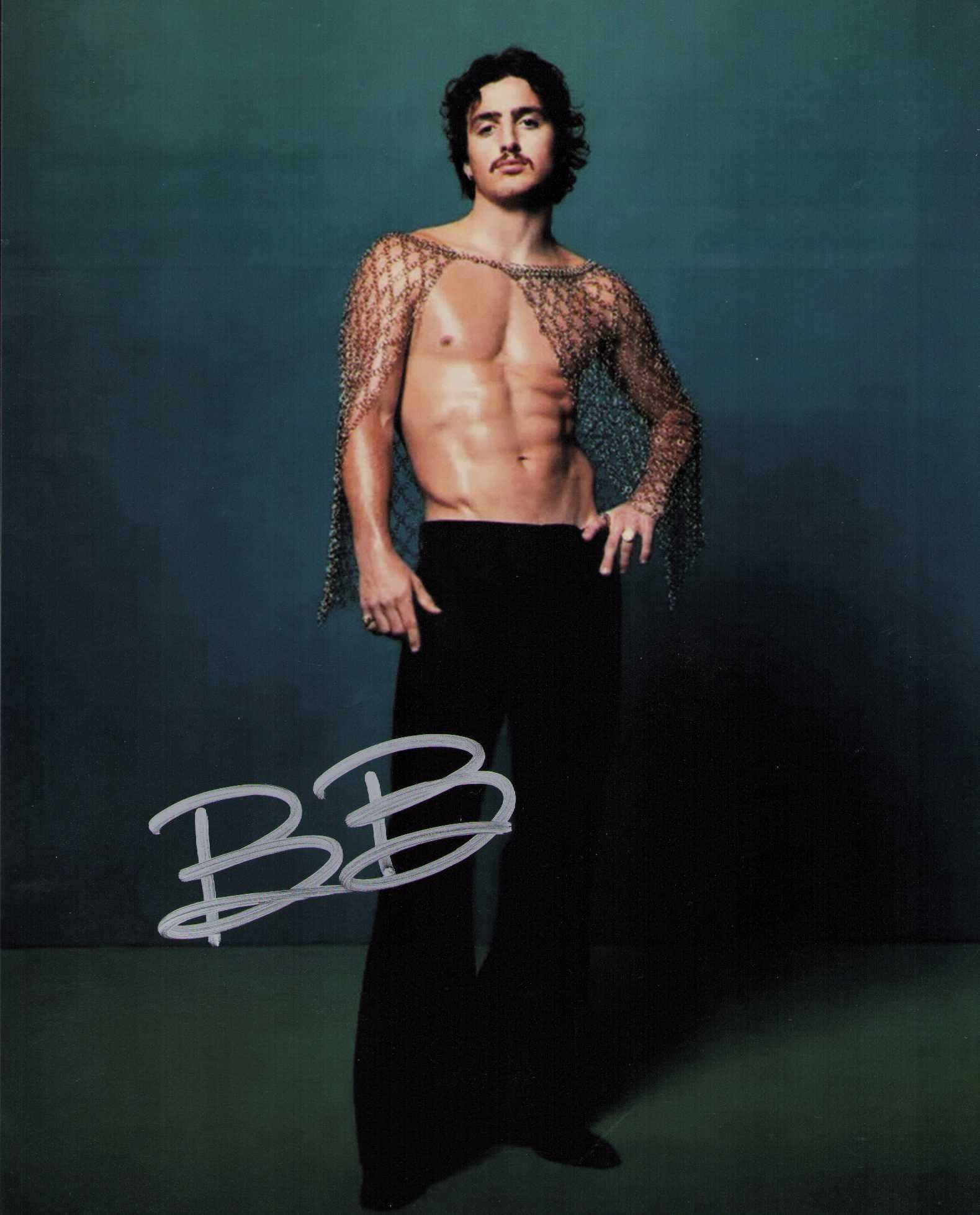 Benson Boone signed photograph: A shirtless signed 8x10 of the new pop singer Certificate of AuthenticityEVERY item in this auction comes with at minimum one fully illustrated and serial numbered COA signed by the worlds leading aut