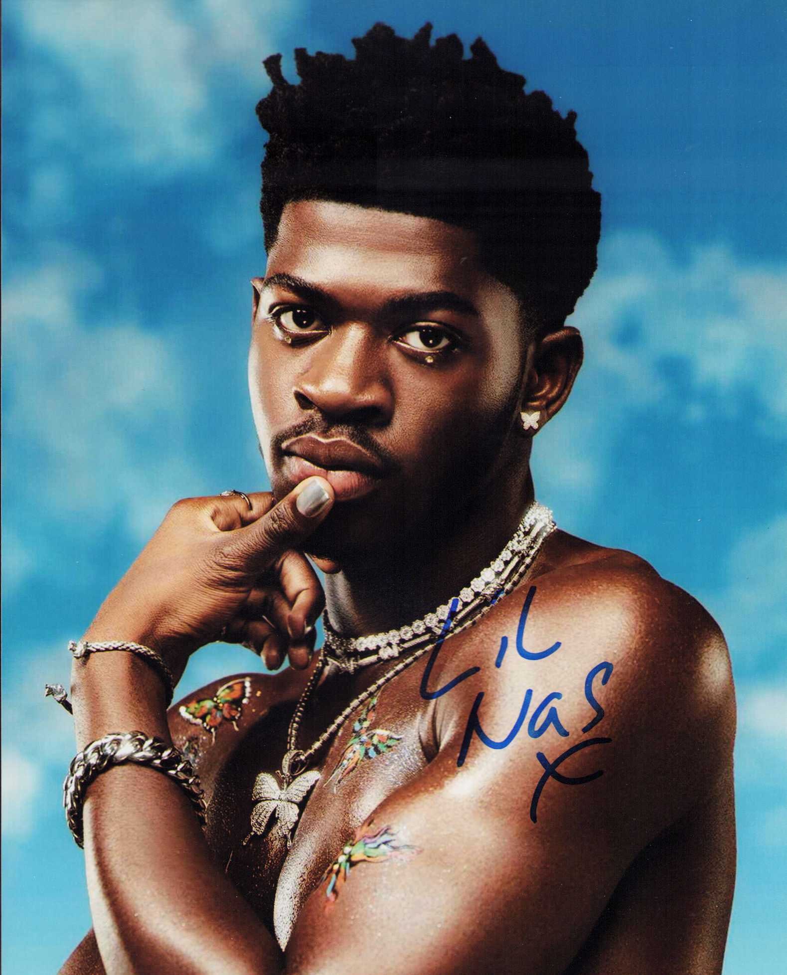 Lil Nas signed photograph: Scarce signed by new singer Certificate of AuthenticityEVERY item in this auction comes with at minimum one fully illustrated and serial numbered COA signed by the worlds leading authenticator in Ente