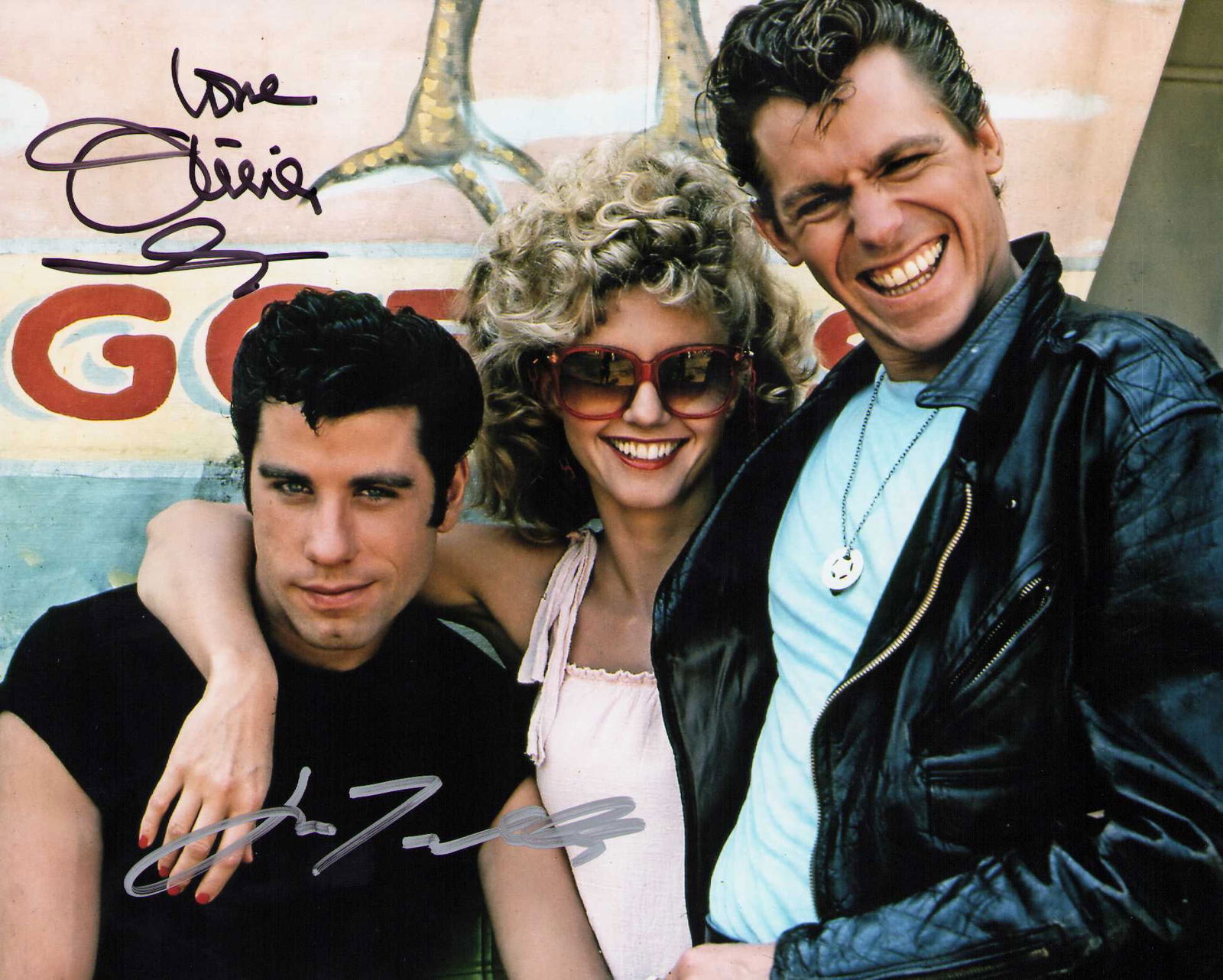 Olivia Newton John signed Grease photograph: GREASE signed 8x10 with her typical Olivia now sadly deceased Certificate of AuthenticityEVERY item in this auction comes with at minimum one fully illustrated and serial numbered COA signed by the