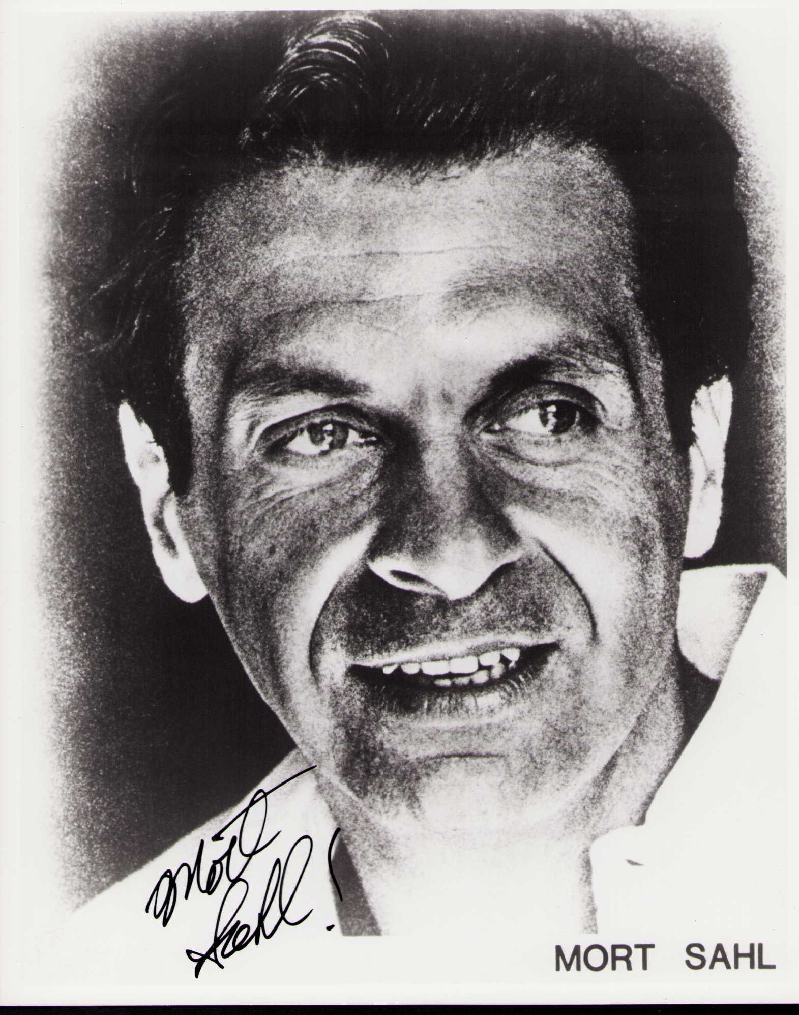 Mort Sahl signed photograph: A rare vintage signed 8x10 of him Certificate of AuthenticityEVERY item in this auction comes with at minimum one fully illustrated and serial numbered COA signed by the worlds leading authenticator