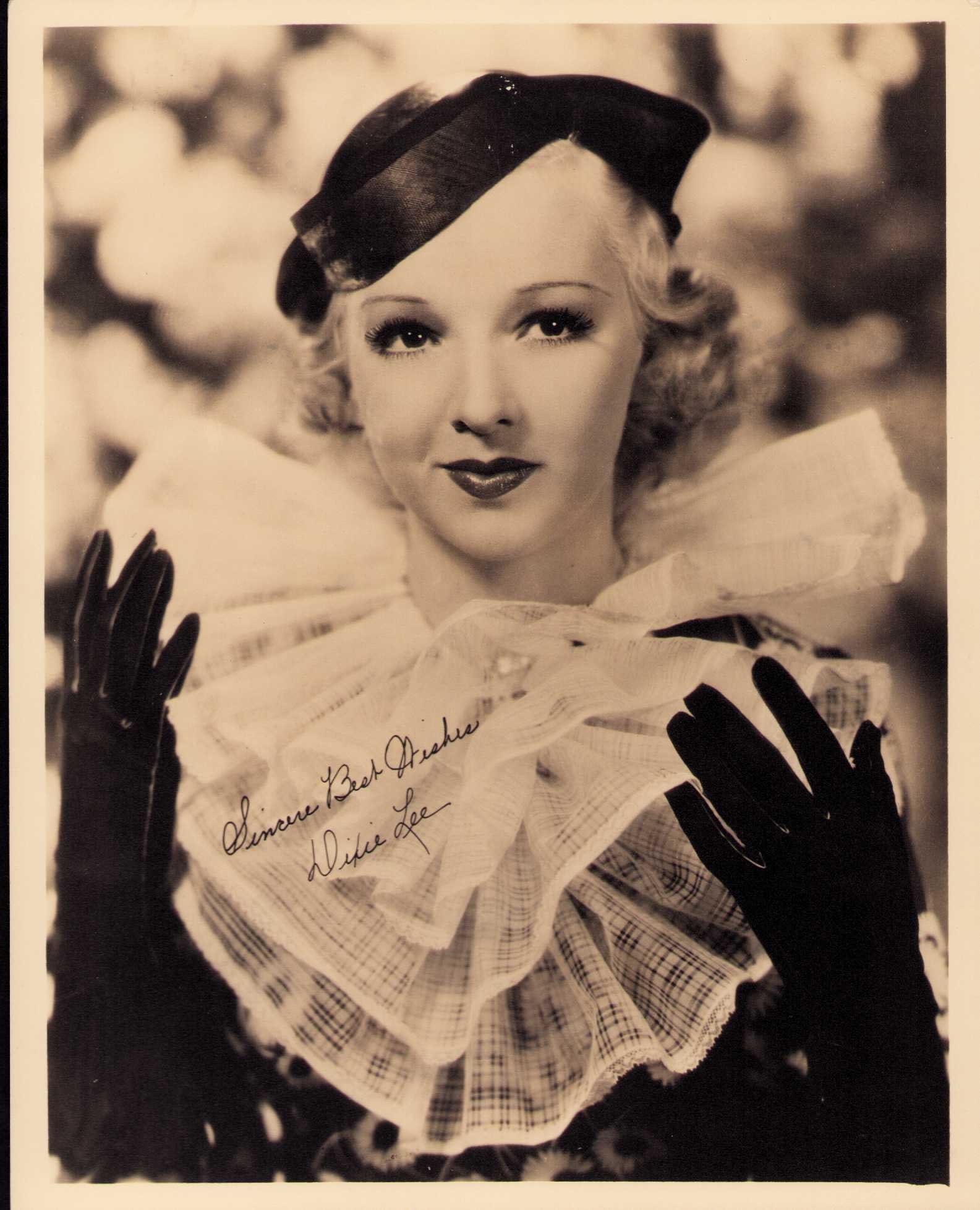 Dixie Lee signed photograph: Sepia toned heavyweight vintage signed still 8x10 scarce Certificate of AuthenticityEVERY item in this auction comes with at minimum one fully illustrated and serial numbered COA signed by the worlds
