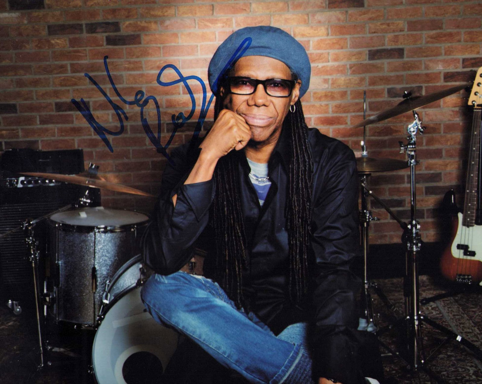 Niles Rodgers signed photograph: The famed musician scarce signed 8x10 photograph Certificate of AuthenticityEVERY item in this auction comes with at minimum one fully illustrated and serial numbered COA signed by the worlds leading