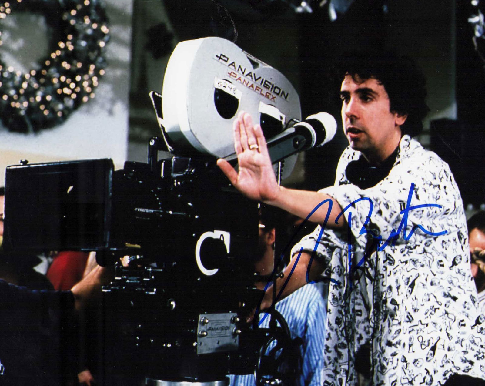 Tim Burton signed photograph: The Director of countless classics from Keatons Batman seen directing in this shot to Beetlejuice Willy Wonka Edward Scissorhands etc Certificate of AuthenticityEVERY item in this auction comes with a