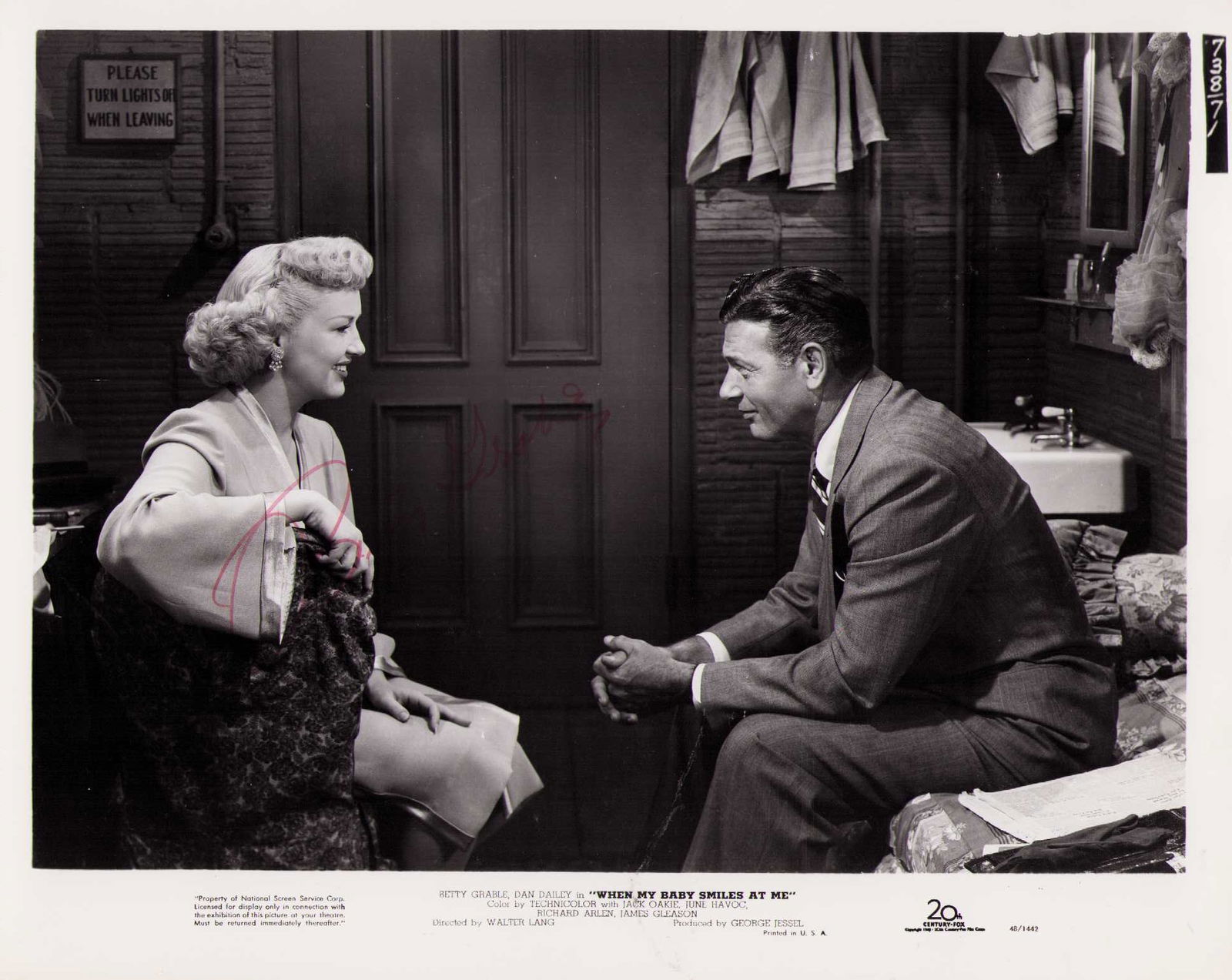 Betty Grable signed photograph: An original signed 8x10 still by the actress who was also the number one pin up in WWII Certificate of AuthenticityEVERY item in this auction comes with at minimum one fully illustrated and serial num