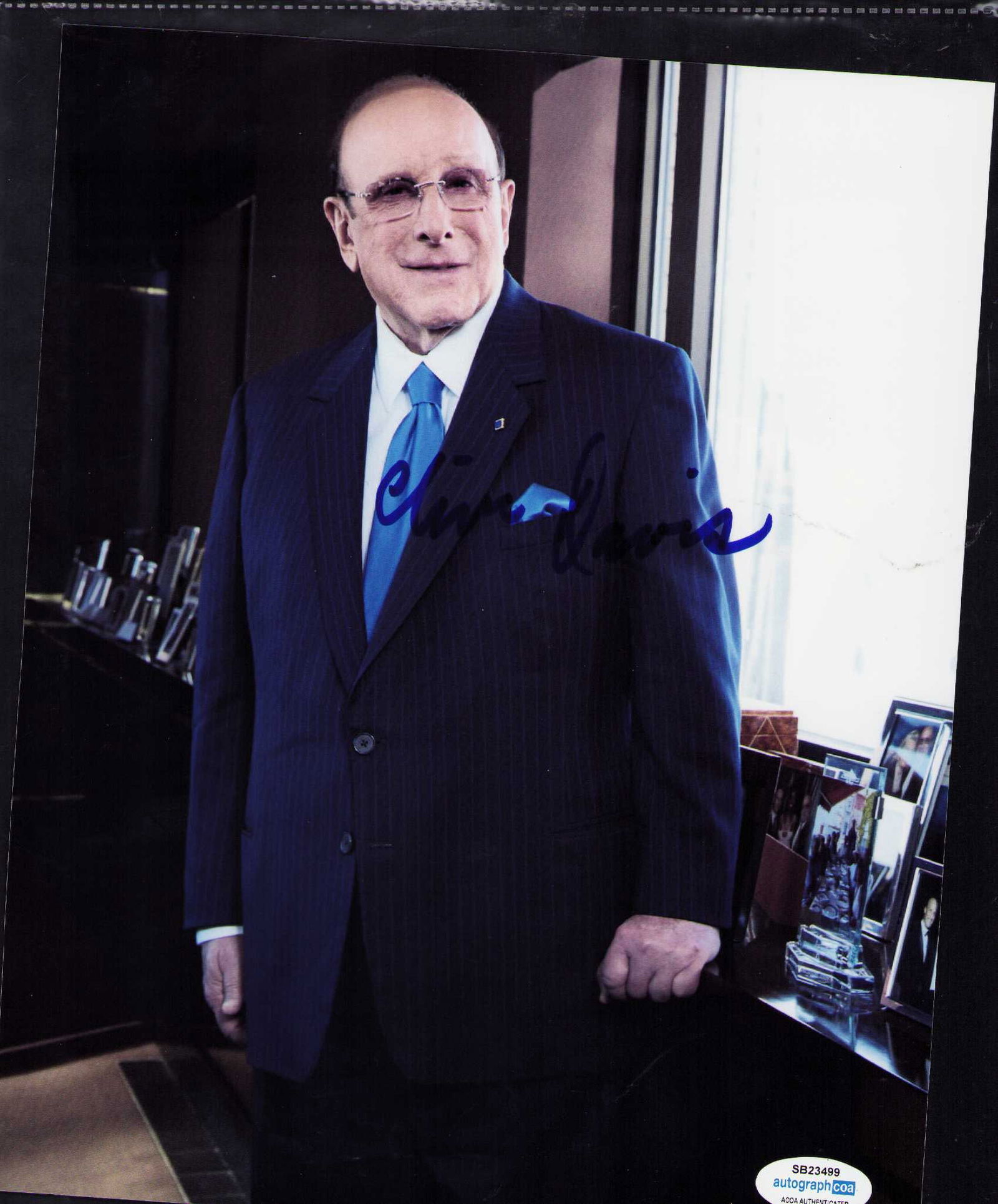 Clive Davis signed photograph: Signed 8x10 of the music mogul legend discovered SO many legends himself Certificate of AuthenticityEVERY item in this auction comes with at minimum one fully illustrated and serial numbered COA signe
