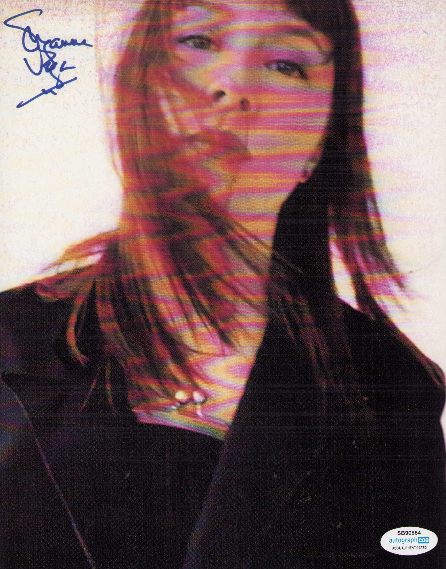 Suzanne Vega signed photograph: Small damp stain on top reverse of photo affecting nothing but mentioned for the sake of completeness 80s singer Certificate of AuthenticityEVERY item in this auction comes with at minimum one fully i